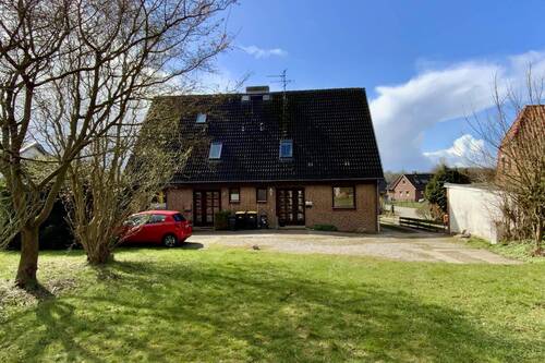 Ansicht Gesamthaus - 4 Zimmer Doppelhaushälfte zum Kaufen in Stockelsdorf