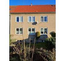 Drei vermietete Wohnungen + eine zum ausbauen in Anklam, Reihenmittelhaus in Stadtrandlage!