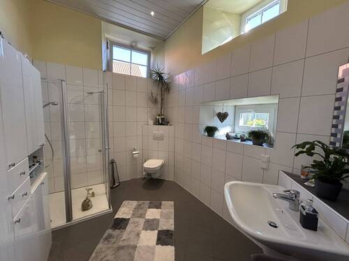 Badezimmer - Mehrfamilienhaus, Wohnhaus mit 394,00 m&sup2; in Münster zum Kaufen