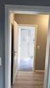 Schlafzimmer mit Durchgang zur Ankleide und zum Ba - 
