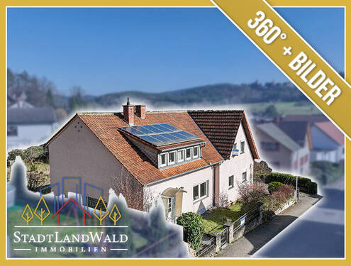 Titelbild - Wohnen mit Burgblick - Großzügiges Einfamilienhaus mit Garten und Ausbaupotenzial in Dahn