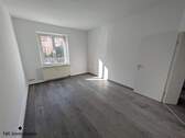 Wohnzimmer (EG-Wohnung) - 
