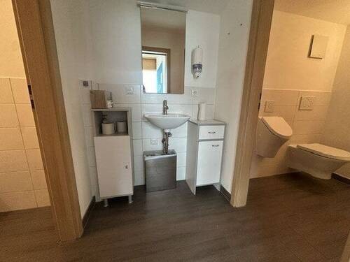 Damen- und Herrentoilette - 
