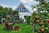 Die Südansicht Ihres neuen Zuhause - Reihenendhaus mit 3 Etagen, Kamin, Carport und Südgrundstück in Schwerin - Ostorf
