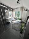 Bad OG mit bodentiefer Dusche - 