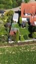 Drohne - Blick vom Feld aufs Haus - 