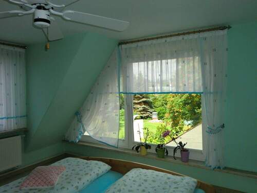 Zimmer im Dachgeschoss - 