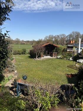 Blick von der Früstücksterrasse - Einfamilienhaus mit 161,00 m&sup2; in Ganderkesee zum Kaufen