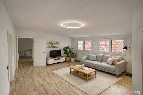 Wohnzimmer - Moderne 4-4,5 Zimmer Dachgeschosswohnung mit großem Balkon & Stellplatz