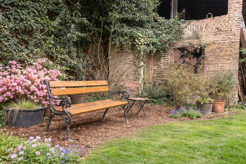 Frühling im Gartencke mit Bank - 