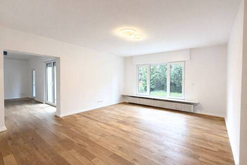 Wohnzimmer Ansicht I - EG - Einfamilienhaus mit 256,80 m&sup2; in Frankfurt am Main zum Kaufen