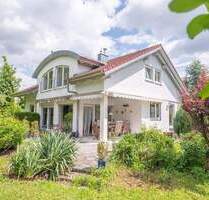 Einfamilienhaus mit Einliegerwohnung, Doppelgarage und Gartenparadies in der Ravensburger Weststadt