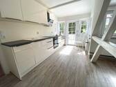 Küche mit Balkonterrassenzugang - Etagenwohnung mit 90,00 m&sup2; in Bad Tabarz zur Miete