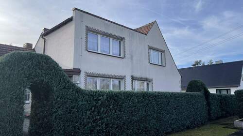 Ansicht vom Garten - Einfamilienhaus mit 141,00 m&sup2; in Lauta zum Kaufen