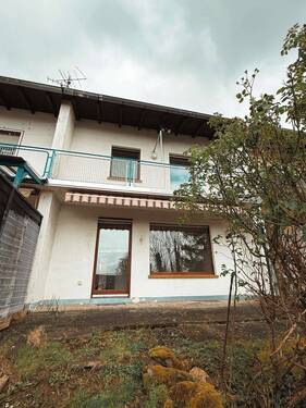 Rückansicht - Charmantes Reihenmittelhaus in beliebter Wohnlage