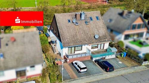 Straßenansicht - Doppelhaushälfte in Münster - 299.000,00&nbsp;EUR Kaufpreis, ca.&nbsp; 131,00&nbsp;m&sup2;&nbsp;Wohnfl&auml;che