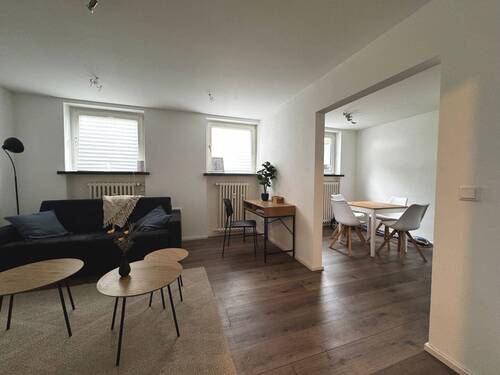 Wohnzimmer - Zentrale Gewerbefläche mit Wohnungscharakter in gepflegtem Mehrfamilienhaus in Essen Rütenscheid!