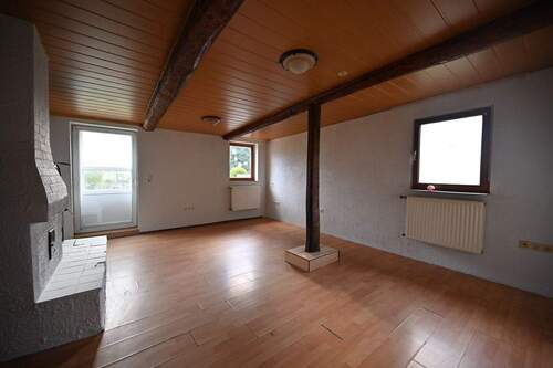 Wohnzimmer EG - Mehrfamilienhaus, Wohnhaus mit 90,00 m² in Hahn zum Kaufen