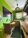 Helle Küche mit grüner Wand - 2 Zimmer Etagenwohnung zum Kaufen in Singen
