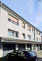 Hausansicht Front - 1 Zimmer Mehrfamilienhaus, Wohnhaus zum Kaufen in Grünberg