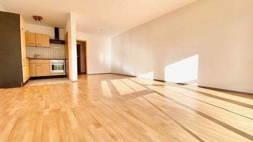 7Wohnen-Essen-Kochen.jpg - Etagenwohnung mit 64,00 m&sup2; in Freilassing zum Kaufen