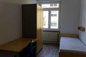 Eines der Bewohnerzimmer - 