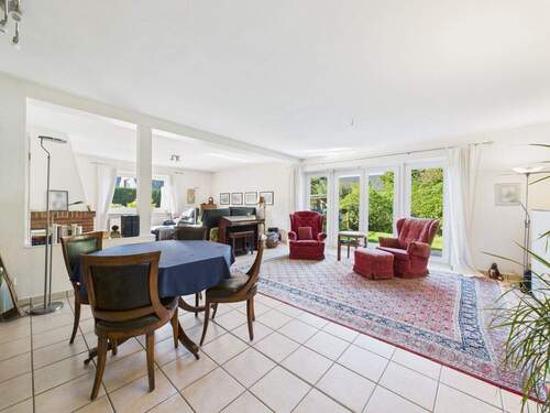 Wohnzimmer - Einfamilienhaus mit 243,00 m² in Husum zum Kaufen