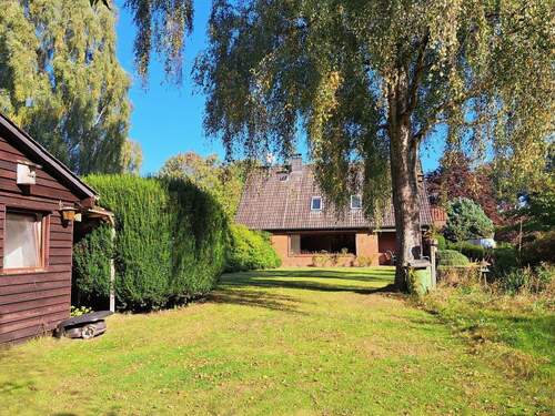 Gartenansicht - Mehrfamilienhaus, Wohnhaus mit 130,00 m² in Hitzhusen zum Kaufen