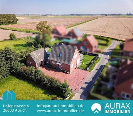 Außenansicht - Einfamilienhaus in Neßmersiel - direkte Deichlage - mit 100.000 € frisch modernisiert