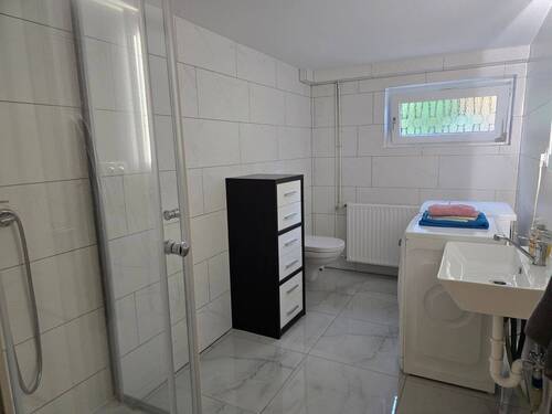 UG Maison Immobilien Bungalow Buchholz Duschbad 1 - 