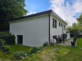 Maison Immobilien Bungalow Buchholz Ansicht UG Terrasse Eingang - 