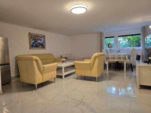 UG Maison Immobilien Bungalow Buchholz Wohnzimmer - 