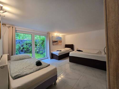 UG Maison Immobilien Bungalow Buchholz Schlafzimmer 2 - 