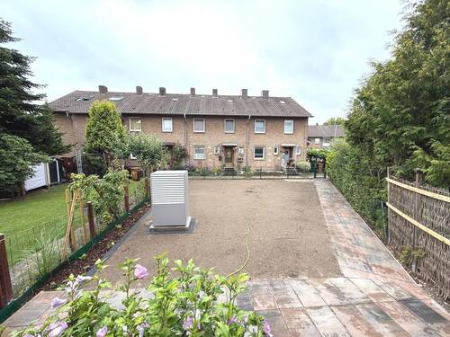 Blick in den Garten - Mehrfamilienhaus, Wohnhaus mit 100,00 m² in Wagenfeld zur Miete