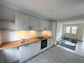 Küche und Zugang zum Wohnzimmer - 