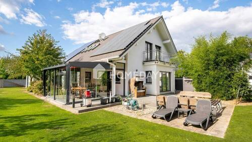 Außenansicht 6 - Energieeffizientes Einfamilienhaus mit vollem Komfort, großem Garten und viel Platz für die Familie