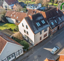 Solides Mehrfamilienhaus mit 3 Wohneinheiten, 4 Garagen und Entwicklungspotenzial - Quakenbrück Altstadt