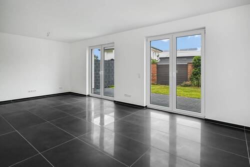 Wohn- und Esszimmer - 5 Zimmer Doppelhaushälfte zum Kaufen in Bohmte