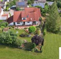 Wohnen wie im eigenen Haus: 4,5 Zimmer mit Garten, Doppelarage und unverbaubarem Blick in Windesheim