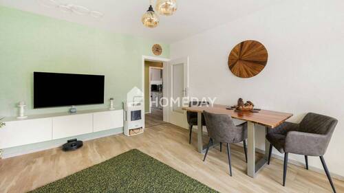 Wohnzimmer 2 - 3 Zimmer Etagenwohnung zum Kaufen in Ratingen