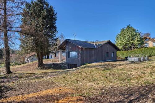 Außenansicht - Alternative zum Neubau: Bungalow mit Bergblick und Entwicklungspotenzial