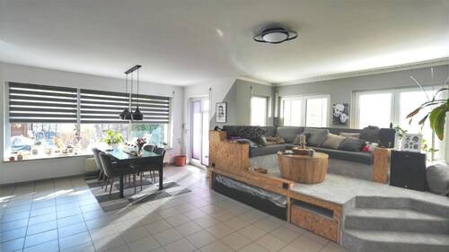 Wohnzimmer mit Zugang zur Terrasse - 