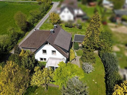 Gartenansicht - Einfamilienhaus mit 225,10 m&sup2; in Hüllhorst zum Kaufen