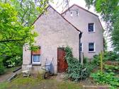 Hausrückseite mit Anbau - 5 Zimmer Mehrfamilienhaus, Wohnhaus in Berlin