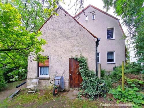 Hausrückseite mit Anbau - 5 Zimmer Mehrfamilienhaus, Wohnhaus in Berlin
