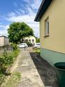 Blick auf den Grundstückseingang.jpg - 2 Zimmer Mehrfamilienhaus, Wohnhaus in Berlin