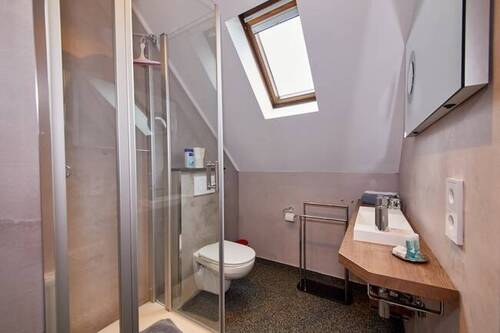 Bad eines der Gästezimmer - 
