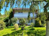 Hausansicht - Einfamilienhaus mit großem sonnigen Grundstück mit Anbaupotential
