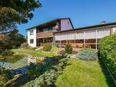 Gartenansicht - Großzügiges Einfamilienhaus mit Potenzial für Generationenwohnen - zentral in Perach