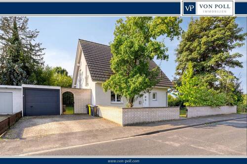 Titelbild - Freistehendes Einfamilienhaus mit großzügigem Garten für entspanntes Familienleben